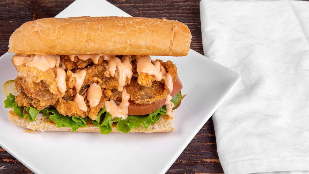 Oy! Po'Boy Sandwich · Battered and fried Oyster Mushrooms with fresh tomato, lettuce, dill pickle, vegan mayo and sriracha aoili on a soft French roll. All Vegan.