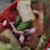 Red Dragon · Sundried tomato basil tortilla, guacamole, tomato, spinach, onion, bell pepper, chicken, & l...