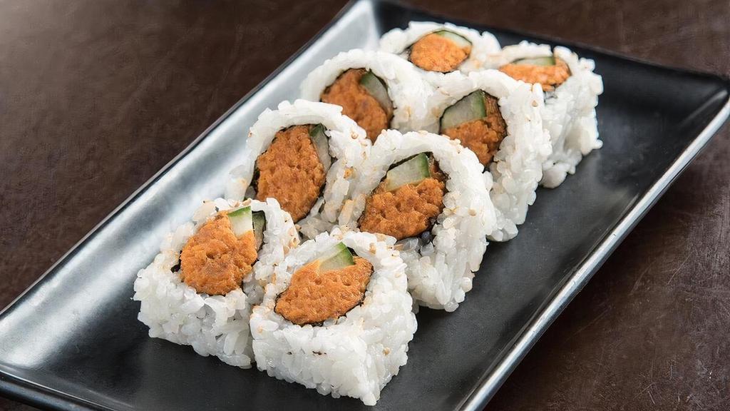 Spicy Tuna Roll · Fresh tuna mixed with spicy mayo sauce, combined with cucumber and rolled in seaweed and rice