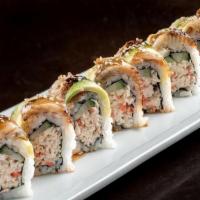 Dragon Roll · Krab† mix and cucumber rolled in seaweed and rice; topped with freshwater eel and avocado sl...