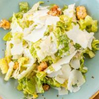 Caesar Salad · Romaine lettuce, parmigiano, and spicy croutons with caesar dressing.