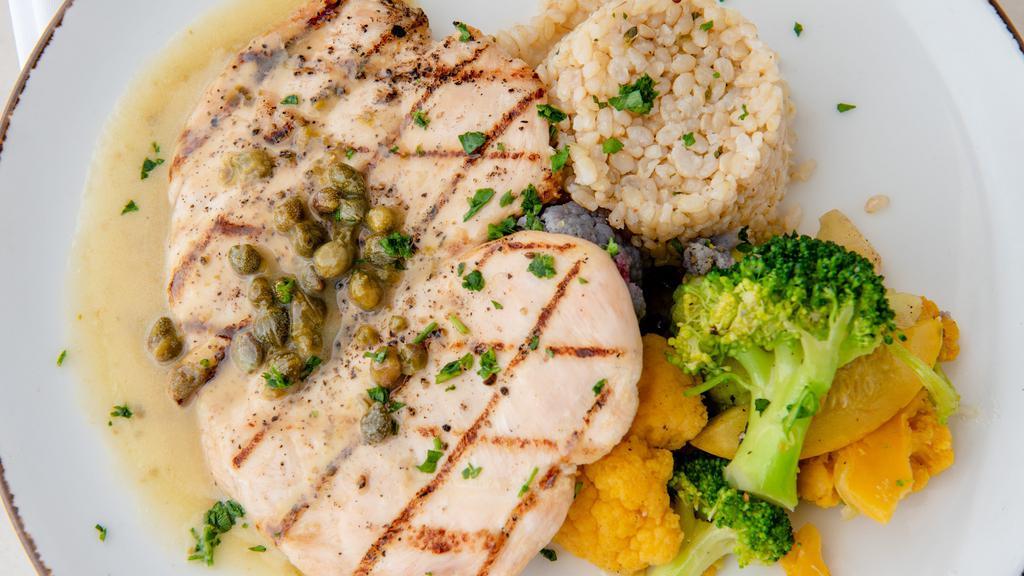 Chicken Paillard · Gluten-free. Grilled boneless and skinless chicken breast, organic market vegetables, and organic brown rice with lemon caper sauce.