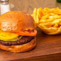 ‘Impossible’ Burger · Vegan. Plant-based vegan burger, lettuce, tomato, and avocado spread on Puritan vegan bun wi...