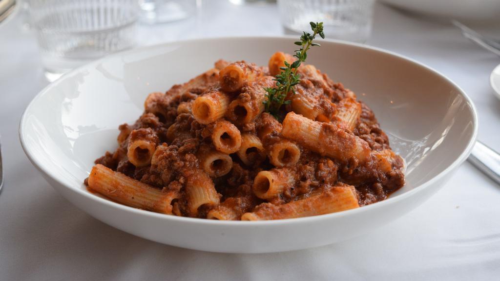 Rigatoni Bolognese · Beef ragu and parmigiano.