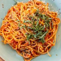 Spaghetti · Fresh tomato basil sauce and parmigiano.