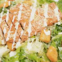 Chicken Caesar Salad · Romain Lettuce, Grilled Chicken Breast, Parmesan Cheese, and Croutons,
Dressing: Caesar
