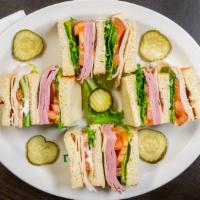 Club Sandwich · Chipotle Mayo. Lettuce, Tomatoes, Ham, Turkey. Bacon, Swiss Cheese,