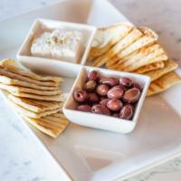 Cheese & Olives · Cheese & Olives
Marinated olives and Feta cheese served with fresh herbs and toasted garlic ...