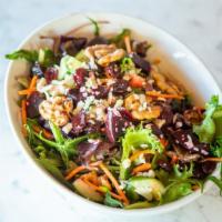 Jewel Salad · Jewel Salad
Mixed greens with a colorful mix of red beets, cucumbers, shredded carrots, Feta...