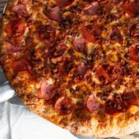 Meat Lovers Pizza · Marinera sauce, mozzarella cheese, ham, pepperoni, sausage, beef, and bacon.