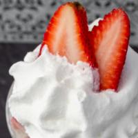 Strawberries With Cream · A cup full of fresh strawberries, with a special made cream, and whipped cream on top. small...