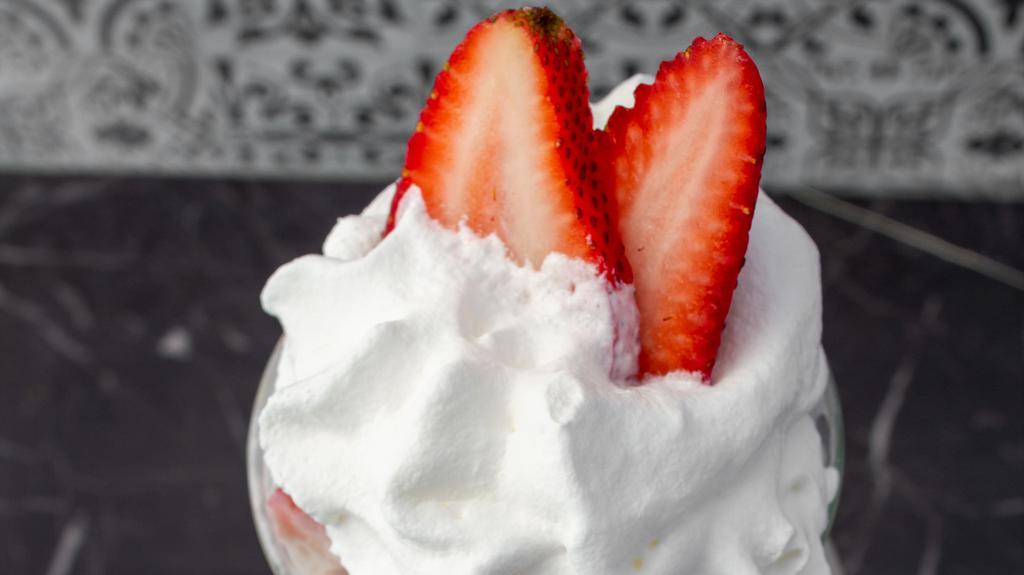 Strawberries With Cream · A cup full of fresh strawberries, with a special made cream, and whipped cream on top. small size price