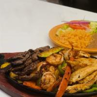 Fajitas Mixtas · Shimp Chosse of chicken or steak fajita mixed with bell pepper and onions served with beans,...