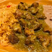 Chile Verde · Diced pork chunks in green sauce served with rice and beans on the side.