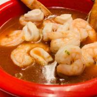Caldo De Camaron Y Abulon · Shrimp and abalone stew.