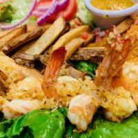 Camarones A La Mojo De Ajo · Jumbo shrimp cooked with butter and fresh garlic served with rice, beans, salad, French frie...