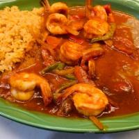 Camarones Rancheros Con Pulpo · Jumbo shrimp with octopus in a red sauce served with rice and beans.