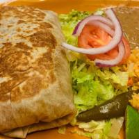Vegetarian Super Burrito · Rice, beans, cheese, pico de gallo, sour cream, cheese, and guacamole.