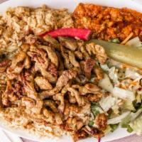 Shawarma Plate · Includes: two sides & pita bread with choice of mixed green or rice.