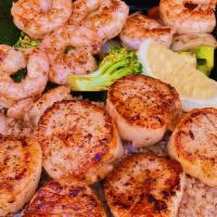 Scallops & Shrimp · Grilled scallops and shrimp served with steamed rice and vegetables
