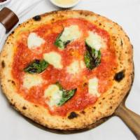 Margherita D.O.C · Organic San Marzano tomato sauce, basil, grana, and Mozzarella di Bufala