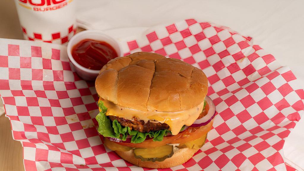 Veggie Burger · Black Bean Veggie Patty, Lettuce, Onion, Tomato, Pickles, American Cheese, and a Thousand Island Dressing.