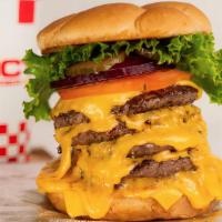 (661) Burger · Six  Slices of American Cheese Melted on Six Quarter-Pound Fresh Beef Patties Topped With Le...