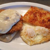 Country Fried Steak · Smothered in country gravy with 2 eggs, hash browns, or country style potatoes & toast,
Engl...