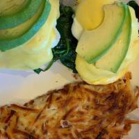Eggs Florentine · Toasted English muffin topped with fresh leaf spinach, poached eggs, and our hollandaise sau...