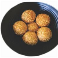 Sesame Balls (6) · Crispy Sesame Seeds on Rice Flour Wrapped with Mung Bean Filling.