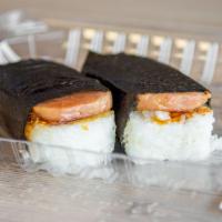 Spam Musubi · One piece of grilled spam with white rice and teriyaki sauce, wrapped in a nori (seaweed she...