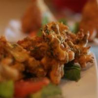 Mixed Vegetable Pakora · Assorted vegetables mixed with chick pea dough and spices deep fried.