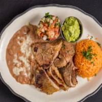 Carnitas Plate · Pieces of pork simmered in herbs, onions and garlic to make them meltingly tender, then brow...