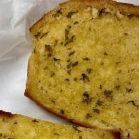 Garlic Bread  · Buttered with garlic and herbs.