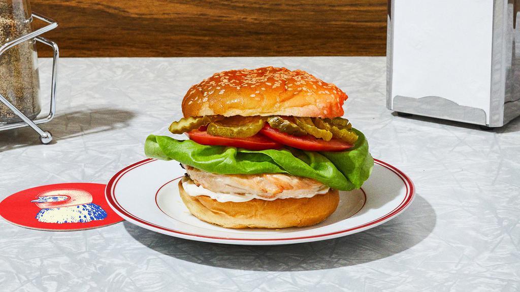The As Good As It Gets Grilled Chicken Sandwich · Our signature grilled chicken served on a toasted bun and topped with lettuce, tomato, pickels, and mayo.