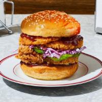 The Best Bbq In Town Fried Chicken Sandwich · Our signature fried chicken served on a toasted bun and topped with deep fried onion rings, ...