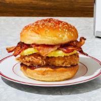 The Hawaiian Fried Chicken Sandwich · Our signature fried chicken served on a toasted bun and topped with pineapple, bacon, and ba...