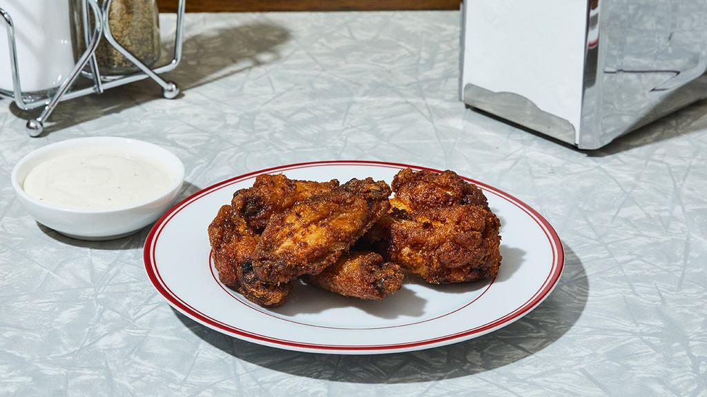 6 Piece Wings · Our signature wings served with your choice of sauce.