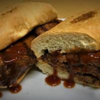 Tri-Tip Sandwich · Sliced grilled tri tip served on a French roll with BBQ sauce.