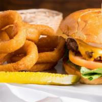 Angus Classic Burger · Angus beef with  lettuce, tomatoes, grilled onions & american cheese, served on a toasted bu...