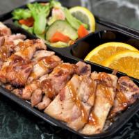 Chicken Plate · 1/2 pound of premium chicken, choice of rice, steamed vegetables with our signature teriyaki...