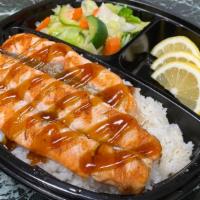 Salmon Plate · Grilled Atlantic salmon, choice of rice, steamed vegetables with our signature teriyaki sauce.