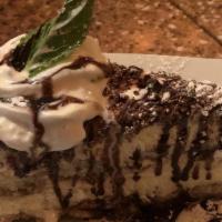 Tiramisu · Lady finger biscuits dipped in espresso layered with a whipped mixture of mascarpone and cus...
