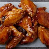10 Wings · 10 bone-in wings tossed in your choice of up to two flavors.