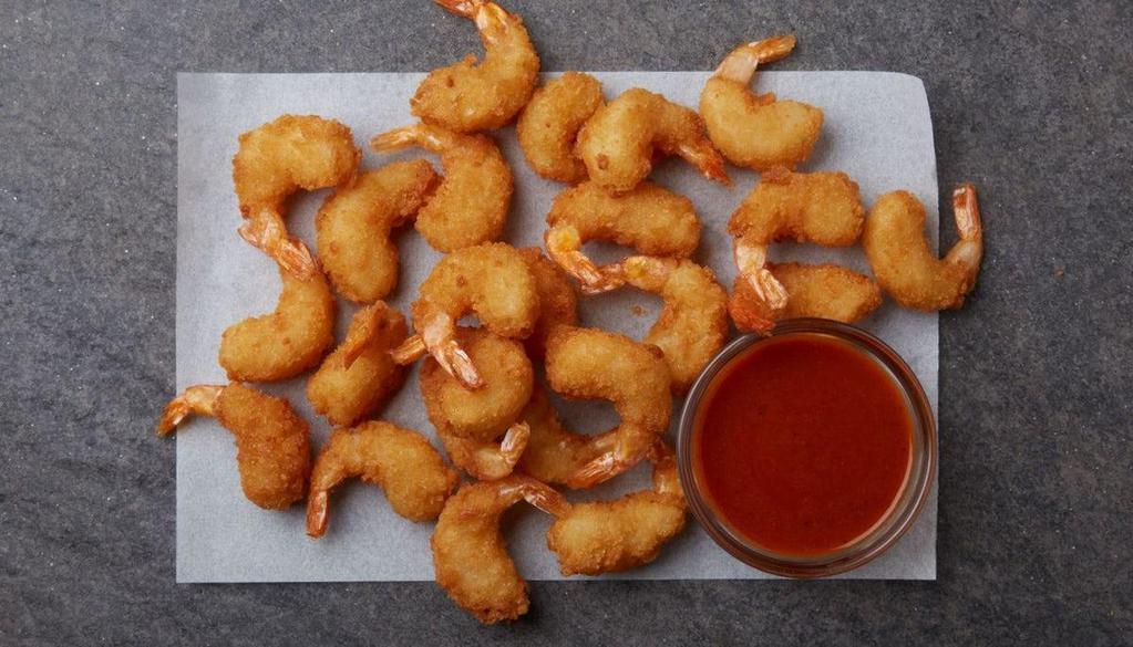 Cajun Shrimp  · Crispy mini shrimp tossed with our Cajun Seasoning, served with a side of ranch dipping sauce, a side of celery & carrots, and ranch.