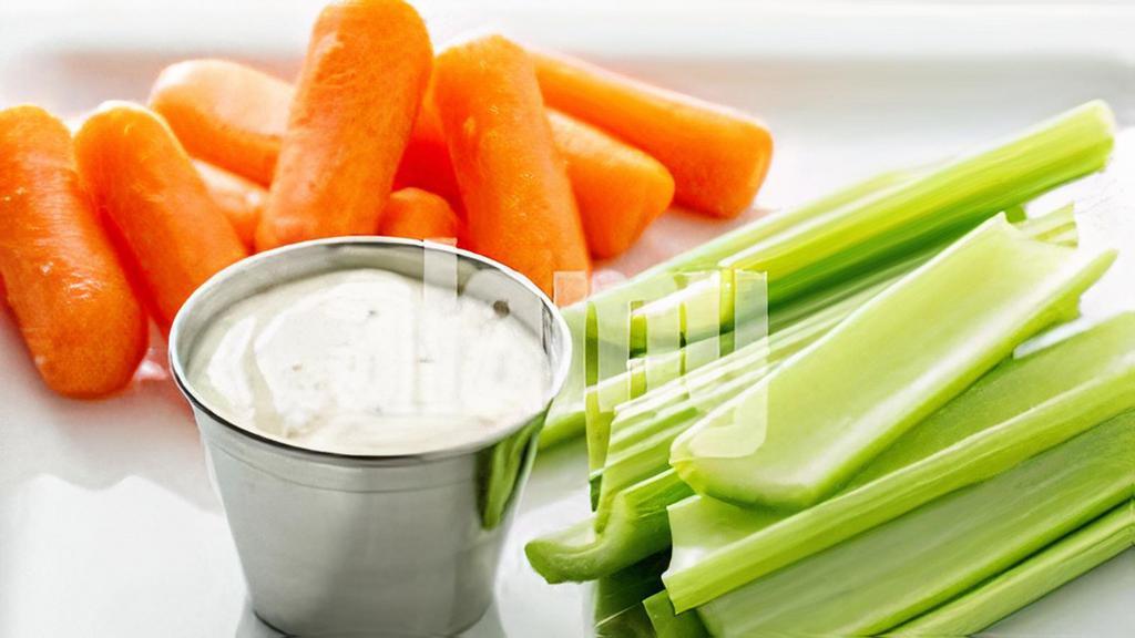 Carrot Sticks And Ranch  · Need some veggies to go with your wings? Celery, carrots and ranch to the rescue.