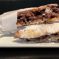 Nutella Panino · Nutella pressed in ciabatta and topped with powdered sugar

Try it with bananas & strawberri...
