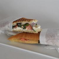 Goat Cheese & Peppers Panini · Goat cheese, roasted red peppers, green onions, basil, capers & olive oil pressed in ciabatt...