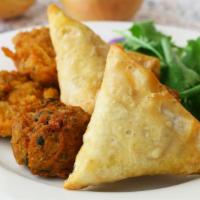 Combo Pakora And Samosa · Vegetarian. Juicy and delicately spiced chicken fritters.