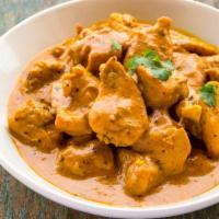 Butter Chicken · Delicious tandoori chicken in a sauce of tomatoes, butter made with housemade exotic spices.